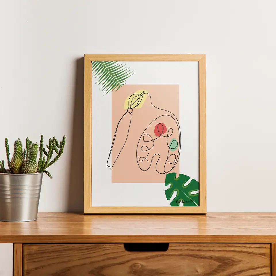 tableau représentant une palette de peinture et un pinceau